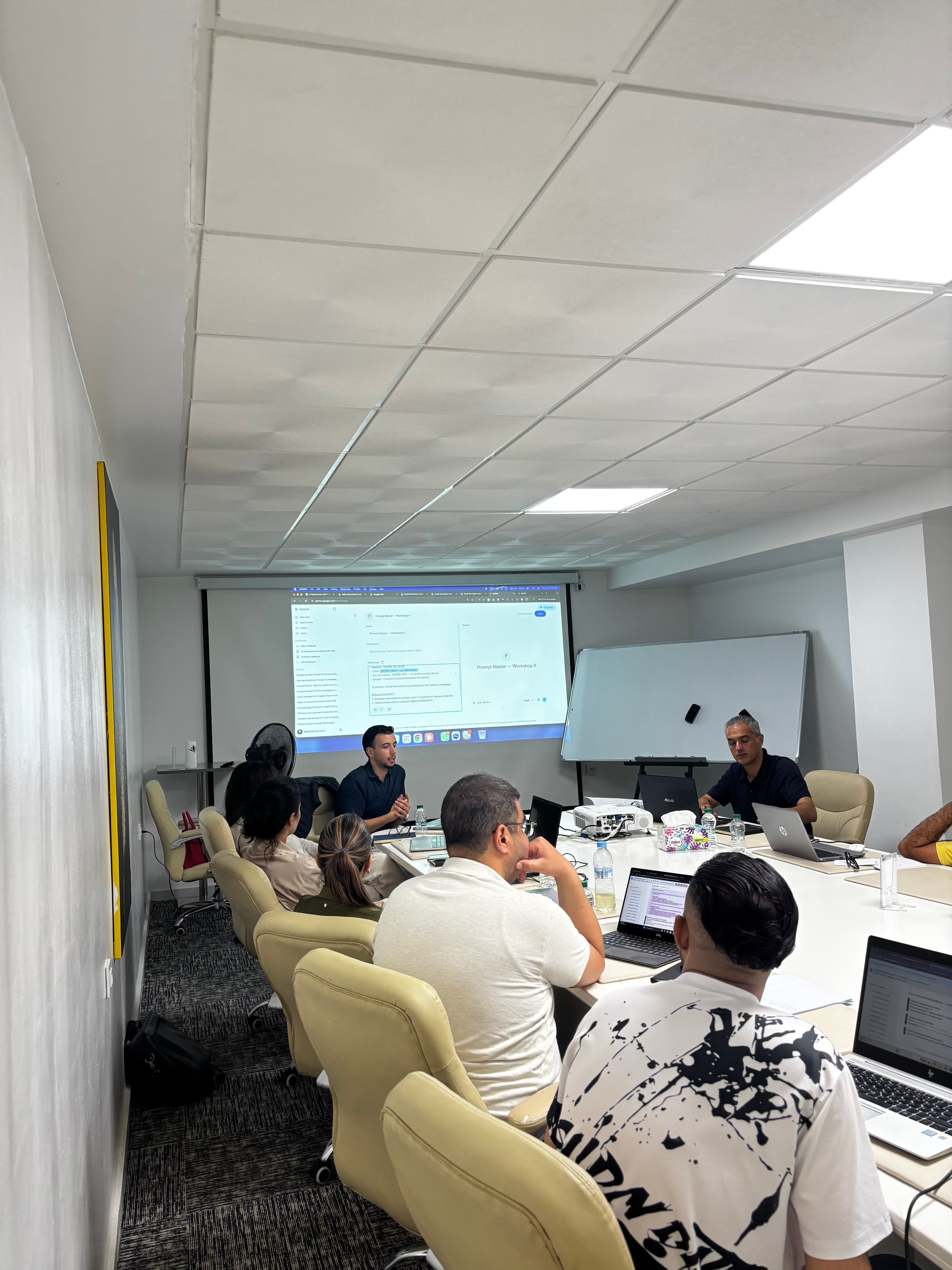 AI training session, participants with laptops